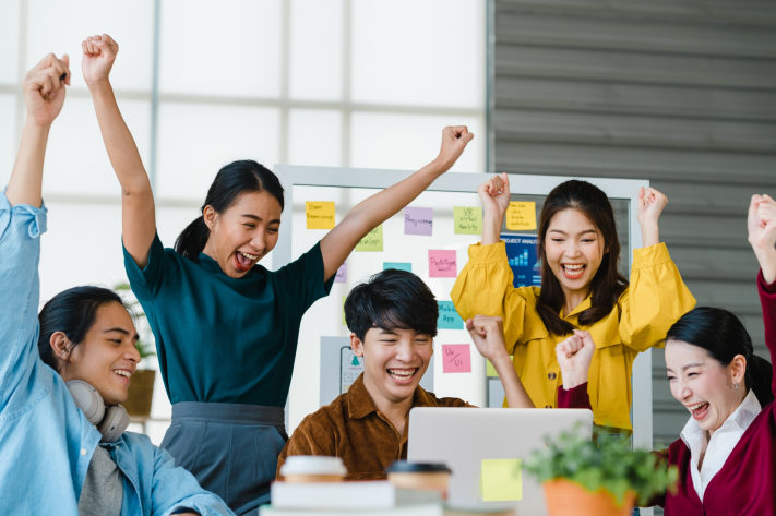 group-asia-young-creative-people-smart-casual-wear-discussing-business-celebrate-giving-five-after-dealing-feeling-happy-signing-contract-agreement-office-coworker-teamwork-concept